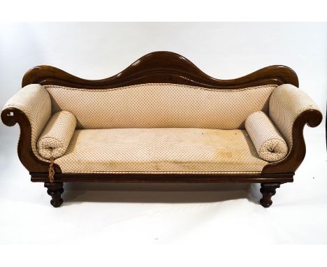 A Victorian mahogany showframe sofa on turned legs, overall 218cm wide