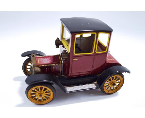 A Schuco 1227 'Old Timer' Ford Coupe 1917, tinplate and clockwork, in original box, no key