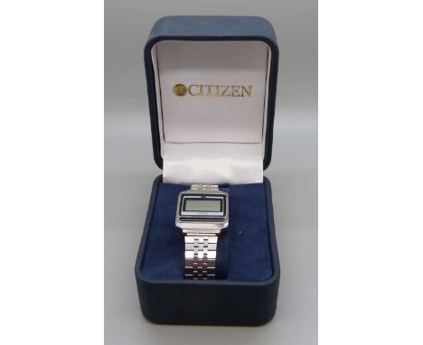 A Timex LCD wristwatch, with Citizen box 