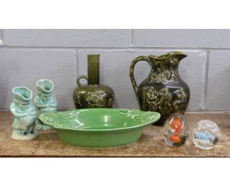 Two glass paperweights, two pieces of Arthur Wood pottery, a French Appolia bowl and two Toby jugs 