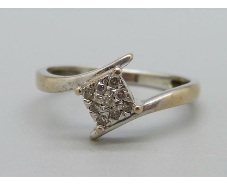 A 9ct white gold and diamond cluster ring, 1.8g, N 