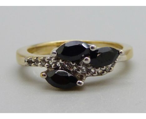 A silver gilt spinel and white stone ring, N 