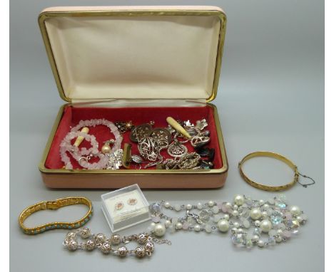 A box of costume jewellery including silver earrings, chain, ring, etc. 