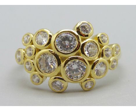 A silver gilt 'rain dance' ring, U 