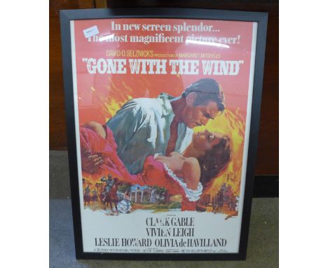 A framed vintage poster for Gone With The Wind 