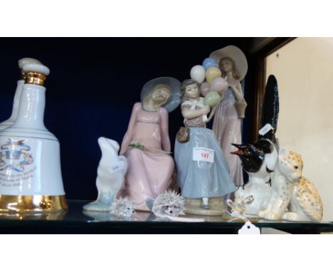 SWAROVSKI: Two hedgehogs and a butterfly, a Lladro figure and other similar ceramics