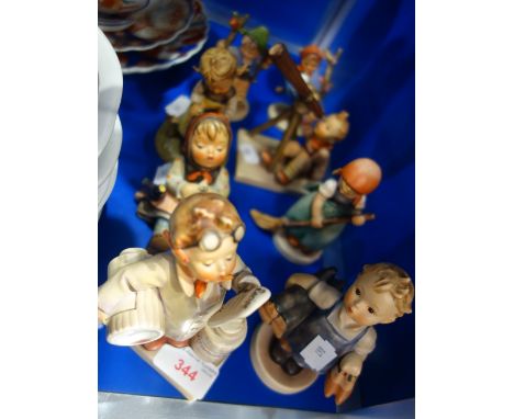 A COLLECTION OF GOEBEL HUMMEL FIGURINES (8)