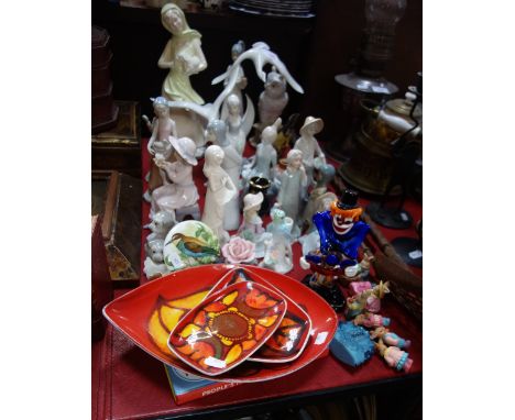 A POOLE POTTERY DISH, a Murano glass clown, a Kaiser ceramic sculpture of geese and other decorative items