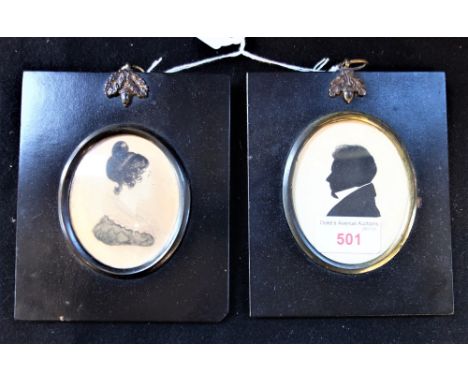 A 19TH CENTURY WATERCOLOUR PORTRAIT MINIATURE of a lady with a lace collar and a silhouette of a gentleman