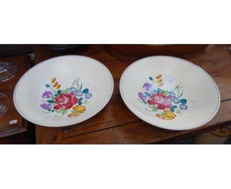 A PAIR OF POOLE POTTERY WHITE BODIED TRADITIONAL CHARGERS, decorated in the LE pattern, painted and printed marks, 32cm dia (