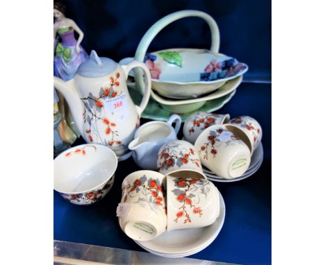 CLARICE CLIFF: A Royal Staffordshire coffee set decorated in grey and red with a Carltonware and two other dishes