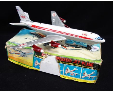 MARX TOYS; A VINTAGE TINPLATE 'TWA' BATTERY OPERATED AIRCRAFT made in Japan, with original box