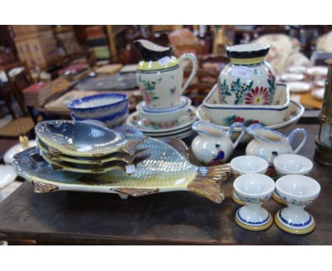 A COLLECTION OF QUIMPER POTTERY and similar Breton style pottery
