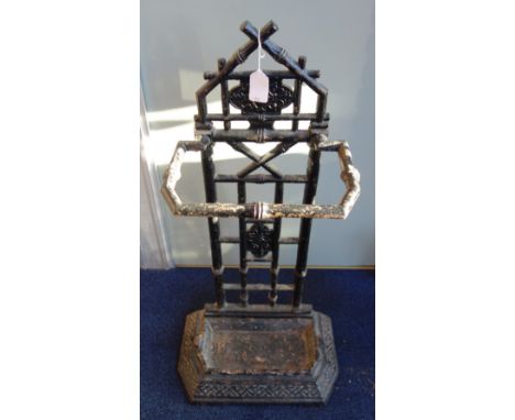 A VICTORIAN AESTHETIC STYLE CAST IRON STICK STAND with faux bamboo detail