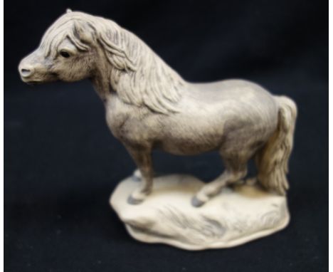 A POOLE POTTERY BARBARA LINLEY ADAMS STONEWARE PONY, incised marks, 19.5cm high
