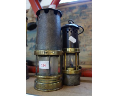 A DAVIS &amp; SON DERBY MINER'S LAMP in brass and steel and another similar