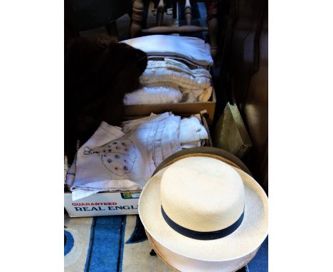 A COLLECTION OF VINTAGE LINENS, textiles, feathers, hats and fans
