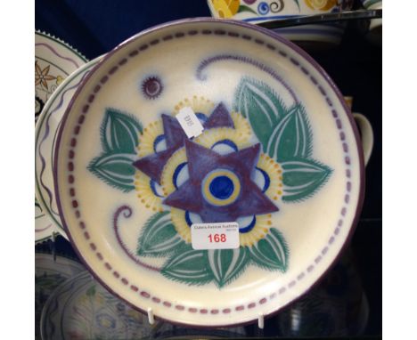 A POOLE POTTERY TRADITIONAL FOOTED DISH, red bodied, shape no. 495, decorated in the ZU pattern, 23.5cm dia