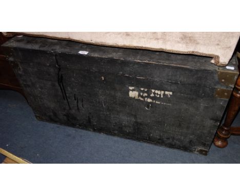A BRASS MOUNTED PAINTED TRAVELLING TRUNK with rope carrying handles, 97cm wide