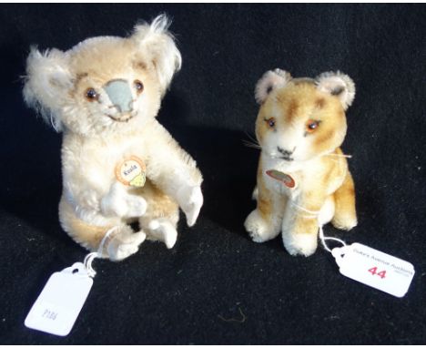 STEIFF; A PLUSH KOALA, with card label,'Koala' (no button) 12.5cm high and a Steiff tiger cub with card label (no button) 10.