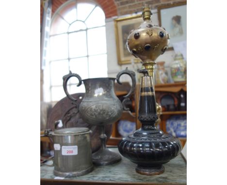 AN INDIAN METAL BOTTLE with elephant form stopper, a lamp made from parts of a hookah pipe and other items