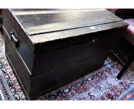 A VICTORIAN GRAINED TRUNK containing fancy dress costumes