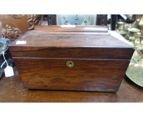 A 19TH CENTURY ROSEWOOD TEA CADDY OF SARCOPHAGUS FORM