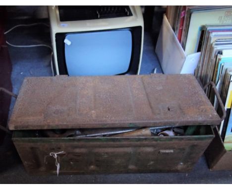 A VINTAGE PORTABLE TELEVISION and an ammunition box containing a collection of hand tools