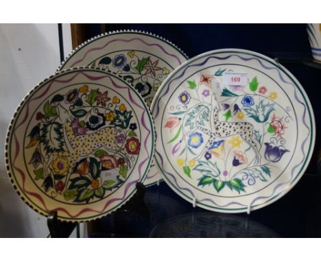 A POOLE POTTERY 'PERSIAN DEER' TRADITIONAL CHARGER, decorated in the SK pattern, 25cm dia, and two others similar (3)