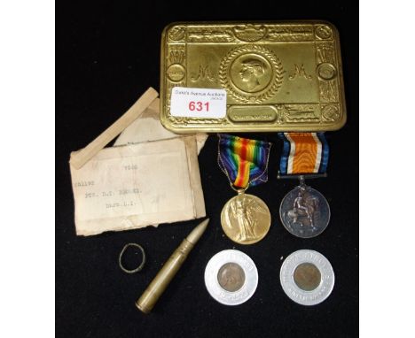 A FIRST WORLD WAR PAIR '251192.PTE.D.T.Brooks.Durh.L.I.' and other items contained in a Princess Mary Christmas 1914 tin