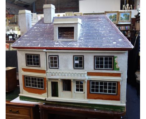 A LARGE VINTAGE 1930S DOLLS HOUSE with a collection of furniture and figures, 101cm high x 125cm wide