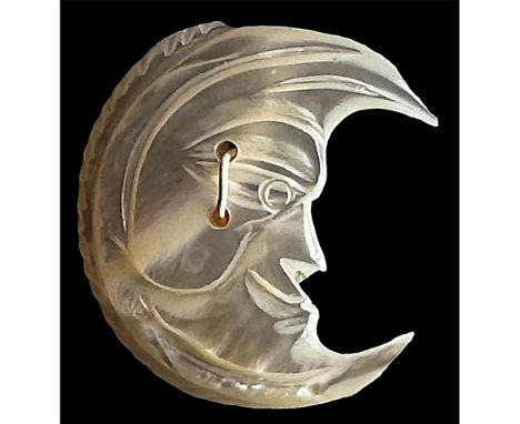 1 Large early 20th century sew thru man in the moon button. Here is a beautifully chatoyant white mother of pearl depicting a