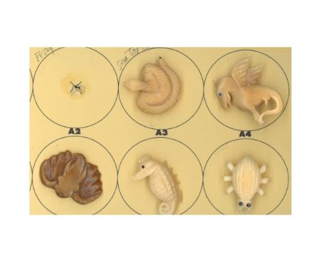 5 Large 20th century realistic carved animal life buttons. These 5 animal life buttons are carved in Vegetable Iv. Which come