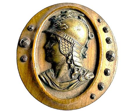 1 19th century brass head of Minerva button. This button has always been a favorite of Bruce's. The detail and the coloration