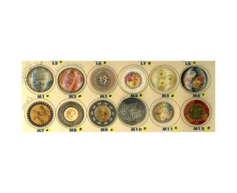 12 Medium 19th &amp; 20th century examples including Schiaparelli. Most examples on this card are celluloid shield buttons in