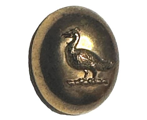 1 Medium 19th century example on an oval shape. Shapes do not come up often on crest buttons and this oval example with a bir