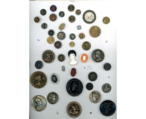 42 S/M/L 19th and 20th century assorted materials. This lot of head buttons include men, women and children. The lot includes