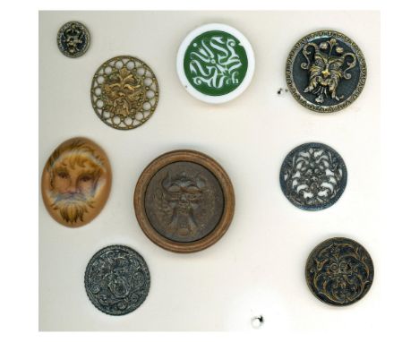 9 S/M/L 19th and 20th century Greenman buttons. Greenman buttons are particularly desirable among collectors today and this s