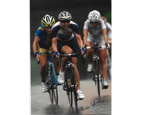 Cycling Nicole Cooke signed 7x5 colour photo pictured in action winning gold at the 2008 Beijing Olympics. Nicole Denise Cook