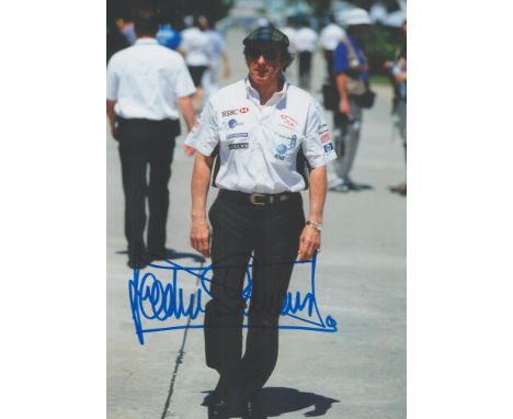 Motor Racing. A Sir Jackie Stewart signed 7x5 colour photo. Sir John Young Jackie Stewart, OBE (born 11 June 1939) is a Briti