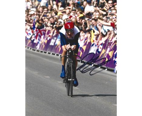 Cycling Bradley Wiggins signed 10x8 colour photo pictured in action during the 2012 London Olympics road time trial. Sir Brad