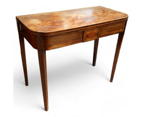 Early 19th century mahogany tea table, D-shaped fold-over top, the frieze with inlaid raised rectangular panel, on square tap