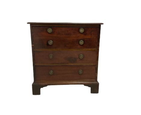 George III mahogany chest converted from a night commode, moulded rectangular top over three drawers, fitted circular pressed
