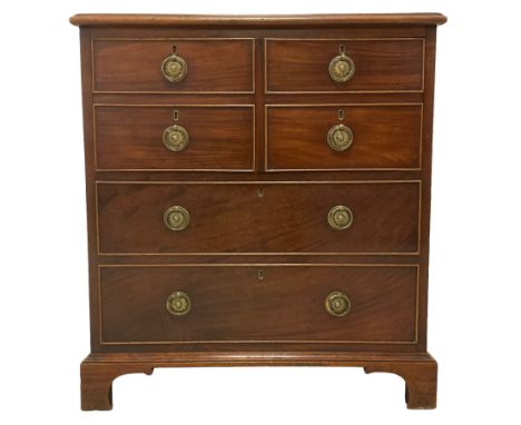 George III mahogany commode, disguised as a chest, moulded hinged top over six false drawers, on bracket feetDimensions: Heig