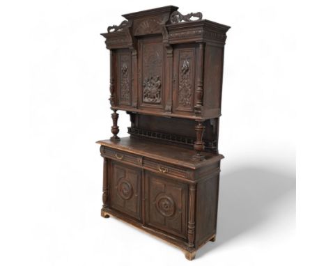 19th century Belgian buffet side cabinet, carved inn scene with figures, fitted with three cupboards, two drawers and two bas
