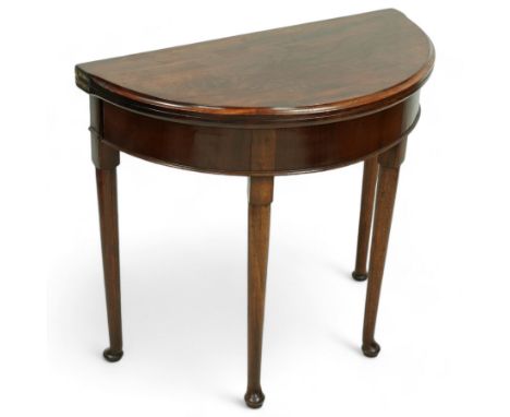 19th century mahogany demi-lune tea table, fold-over top with moulded edge over plain frieze, on tapering supports with gate-
