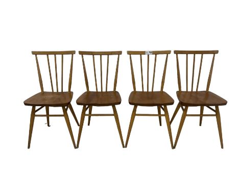 Ercol - set four elm and beech model 391 'kitchen chairs', stick back over shaped seat, tapering supports joined by stretcher