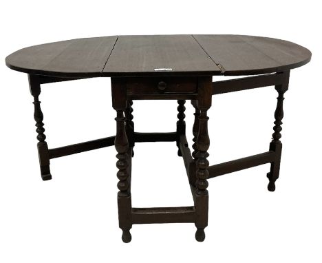 18th century country oak drop-leaf table, oval top, fitted with single drawer, raised on double gate-leg action bobbin-turned