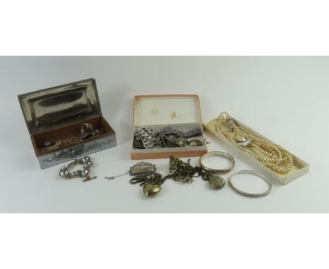 Collection of costume jewellery, including a silver bangle, curb link necklace and an Etruscan style bracelet