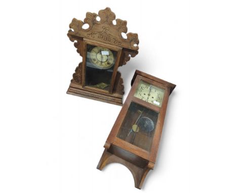 An early 20th Century rectangular oak cased wall clock together with a mantel clock with glass door (2)